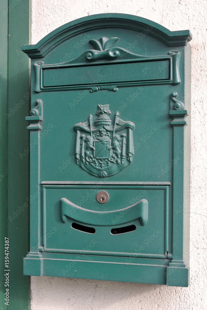 green metal mail box