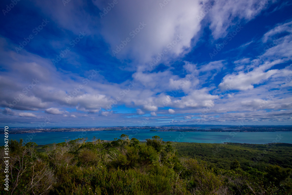 View to Rangitoto Island from North Head in a sunny day with a beautiful blue sky View to Rangitoto Island from North Head in a sunny day with a beautiful blue sky