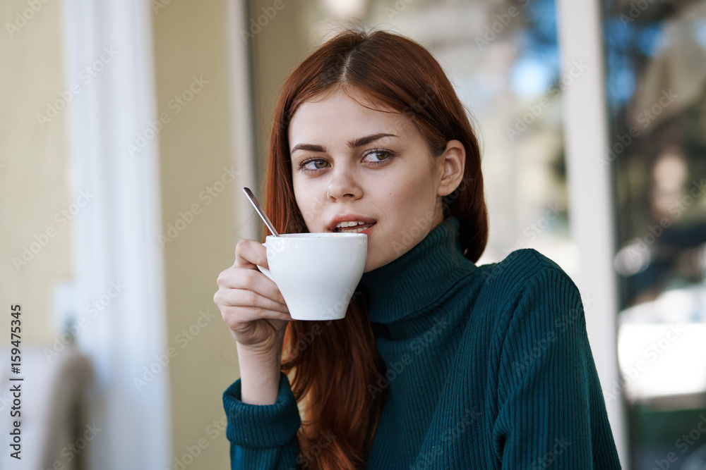 Woman drinking coffee, woman resting in cafe Woman drinking coffee, woman resting in cafe