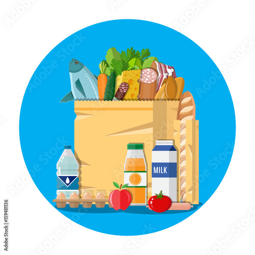 Paper shopping bag full of groceries products
