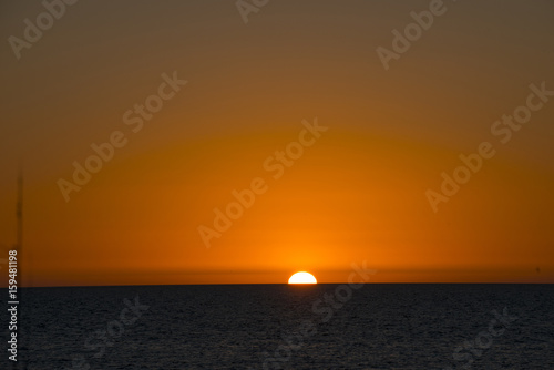orange sunset over ocean  © kevin