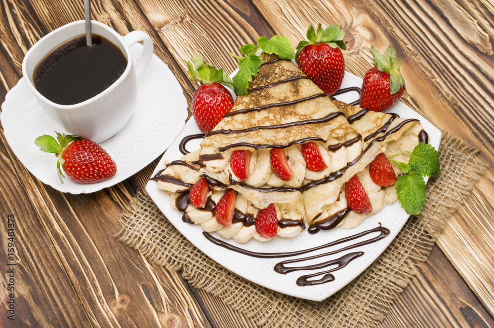 Crepes with Banana and strawberries Crepes with Banana and strawberries
