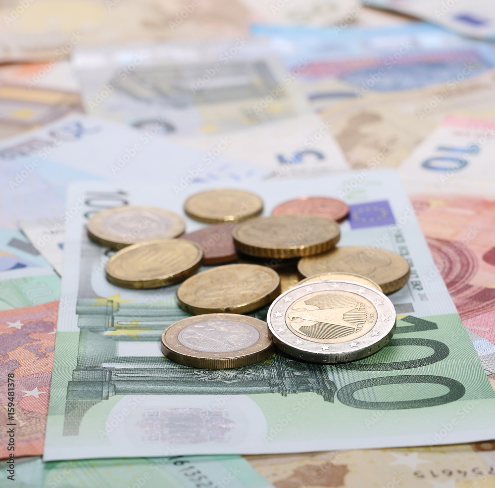 Euro bank notes with metal coins, bills background and texture Euro bank notes with metal coins, bills background and texture