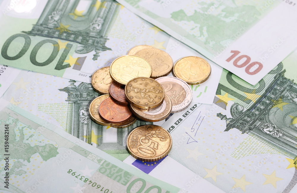 Euro bank notes with metal coins, bills background and texture Euro bank notes with metal coins, bills background and texture