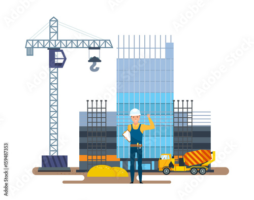 Chief of production against background of multi-storey building under construction.