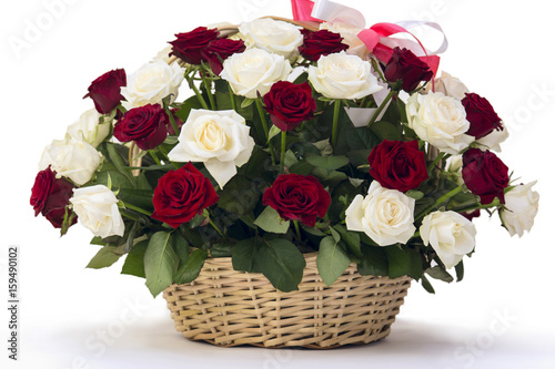 Bouquet of roses in a wooden basket
