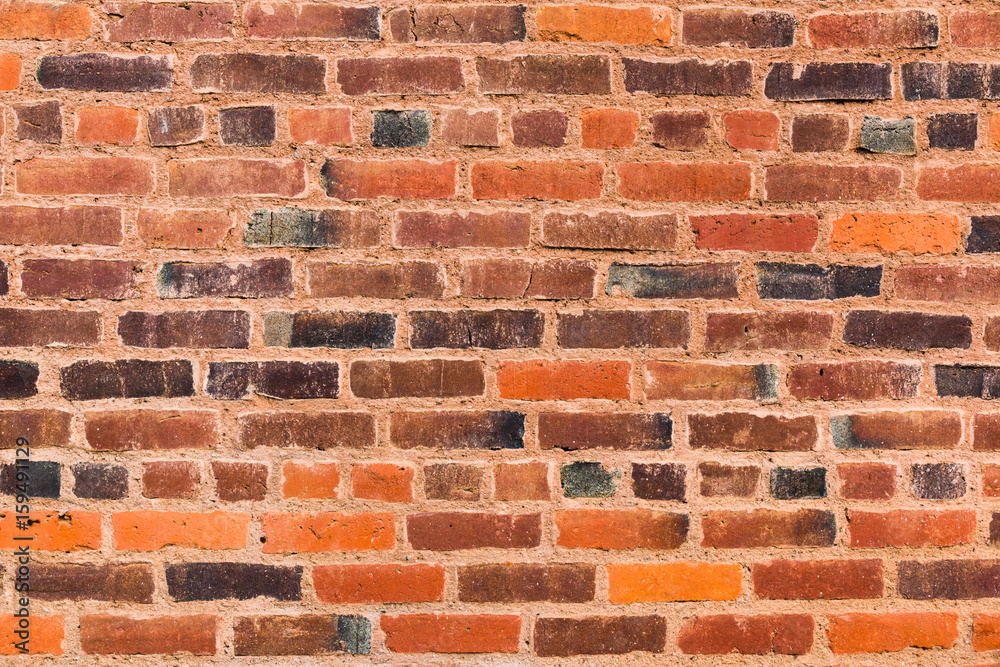 Wall With Different Colored Grunge Textured Bricks Wall With Different Colored Grunge Textured Bricks