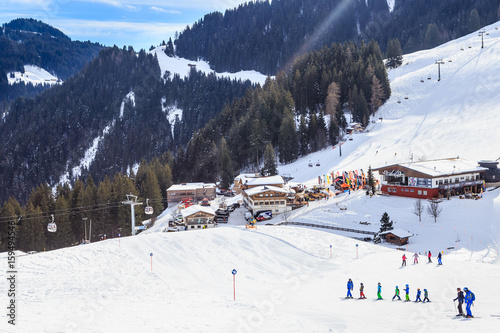 Obraz na płótnie Skiers on the slopes of the ski resort of Soll, Tyrol, Austria w salonie