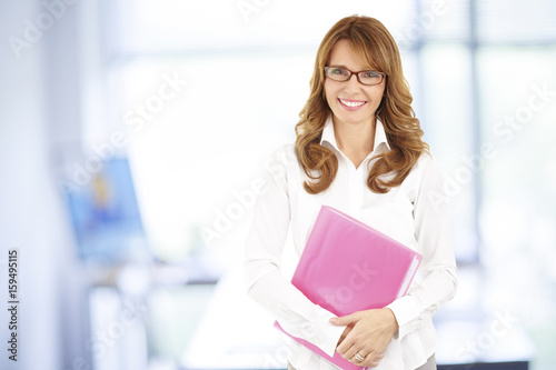 Smiling professional woman portrait Free Download Smiling professional woman portrait - GFXLoad