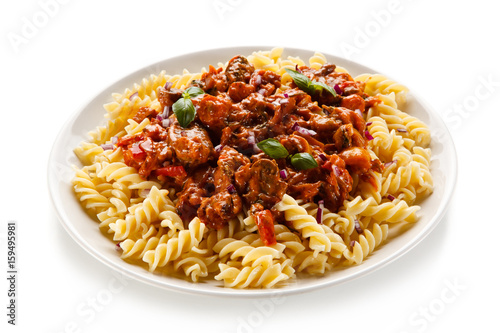 Pasta with tomato sauce on white background 
