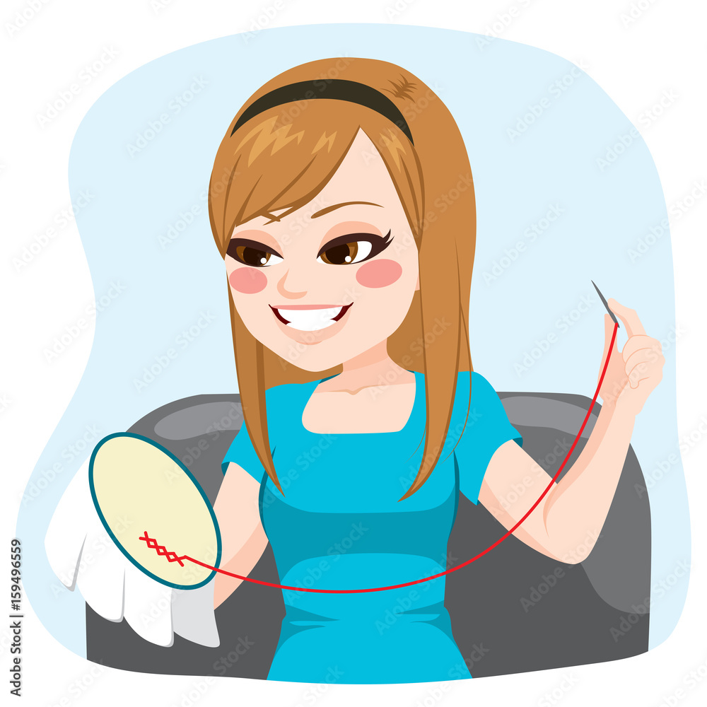 Young happy teenager girl sitting on couch embroidering as a hobby Young happy teenager girl sitting on couch embroidering as a hobby