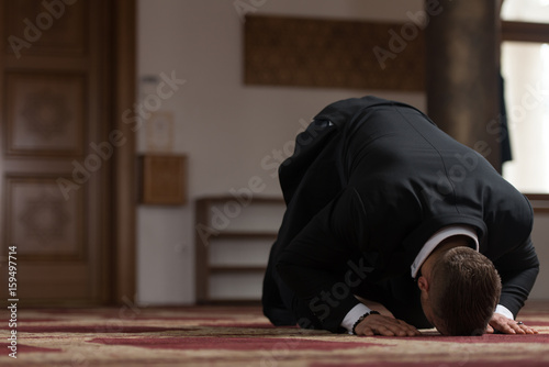 Young Businessman Muslim Praying