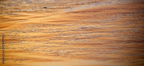 Sunset in water near the coast