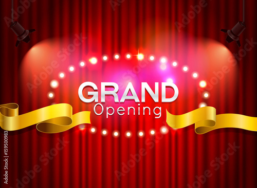 Grand opening cutting red ribbon on curtain with spot light background