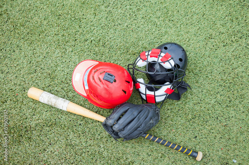 Softball equipment sports on grass field