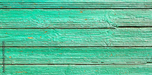 A wood wall painted in green color