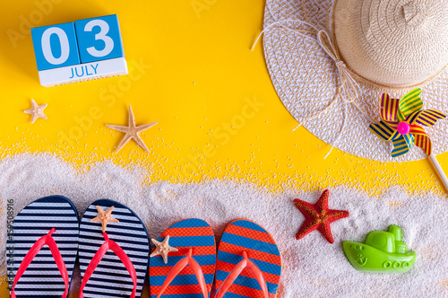 July 3rd. Image of july 3 calendar with summer beach accessories and traveler outfit on background. Summer day, Vacation concept