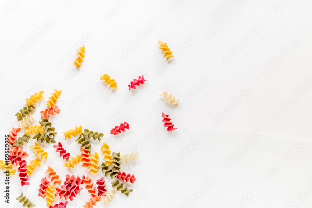 Fusilli pasta on white background top view copyspace Fusilli pasta on white background top view copyspace