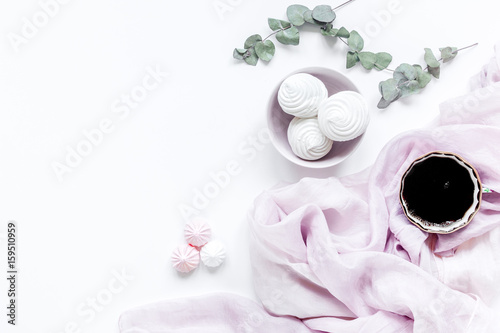 sweet lunch with marsh-mallow and spring flowers for woman on white background top view mockup