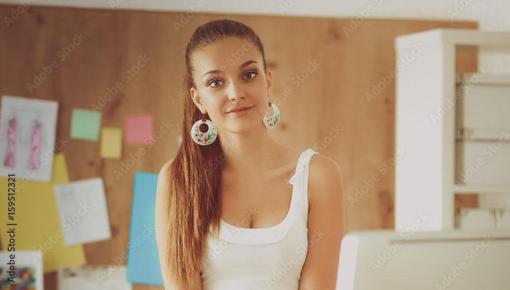 Fashion designers working in studio Fashion designers working in studio