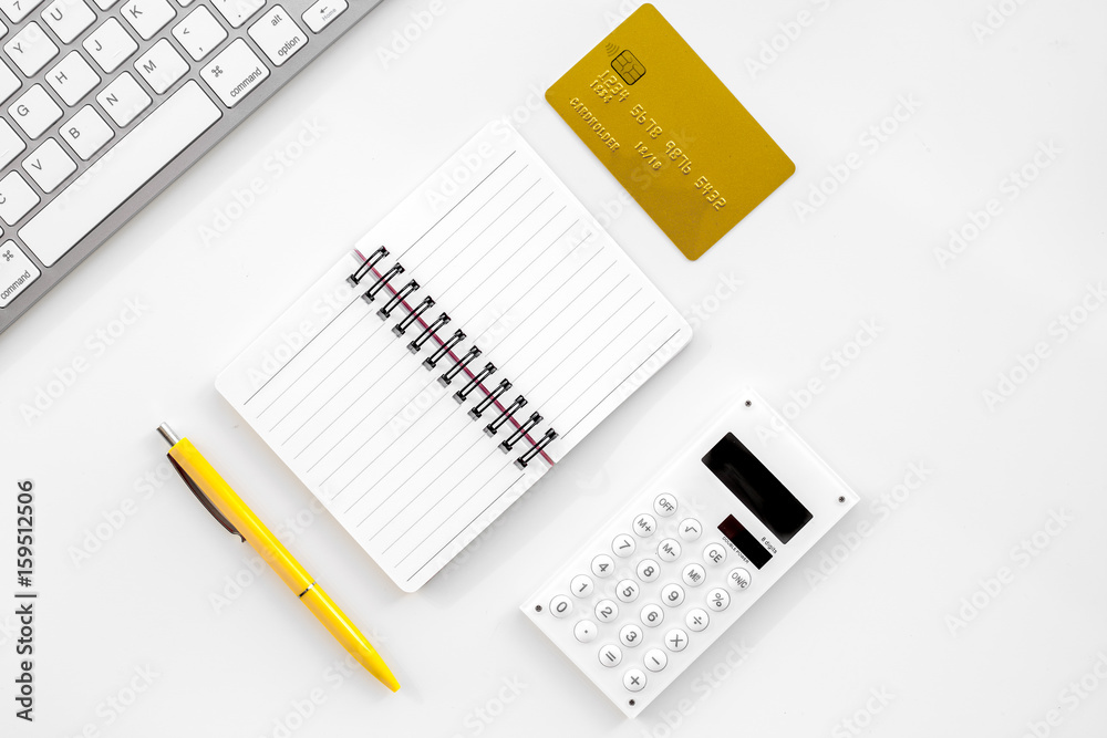 online purchasing with credit cards and notebook white manager desk background top view mock-up online purchasing with credit cards and notebook white manager desk background top view mock-up