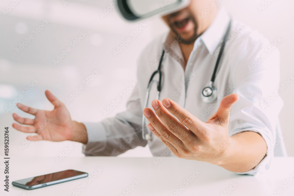 smart doctor wearing virtual reality goggles in modern office with mobile phone using with VR headset