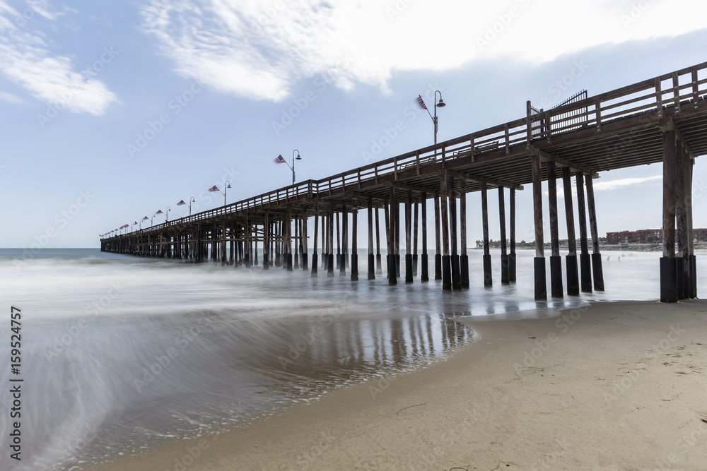 Ventura beach and pier with motion blur water in Southern California.  