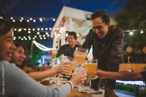 Group Of Friends celebrating the festival and Enjoying Evening Drinks,vintage style.