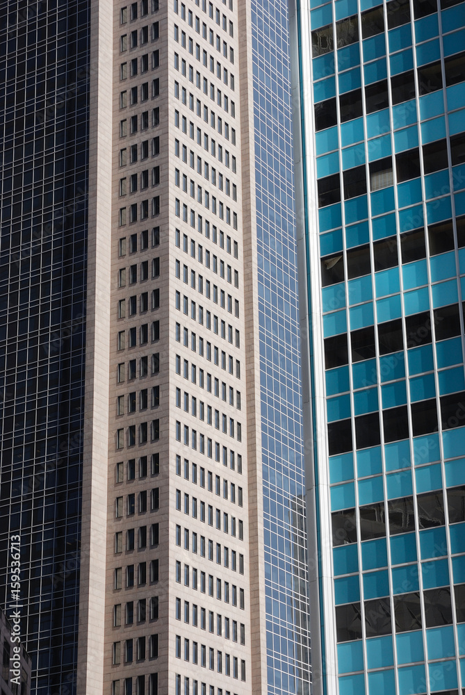 close up on facade view of glass windows in office building