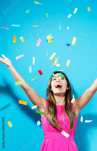 Photography Happy woman celebrating with confetti