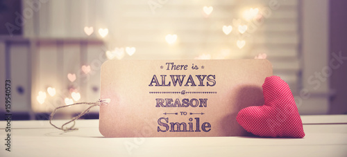 There Is Always A Reason To Smile message with a red heart