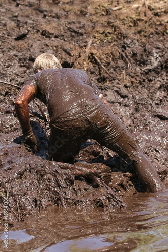 Mud race runners extreme run action sport  