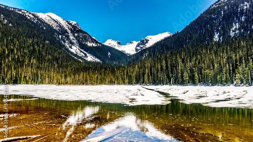 View of the still partly frozen Lower Joffre Lake in the Coast Mountain Range along the Duffy Lake Road, Highway 99, between Pemberton and Lillooet in southern British Columbia