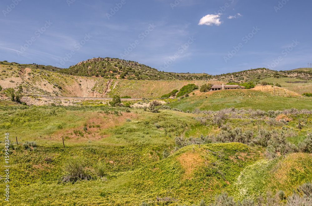 Fototapeta premium Hills, Valleys, and a House