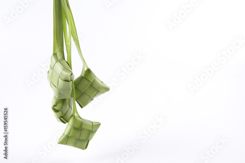 Making of Ketupat, a natural rice casing made from young coconut leaves for cooking rice