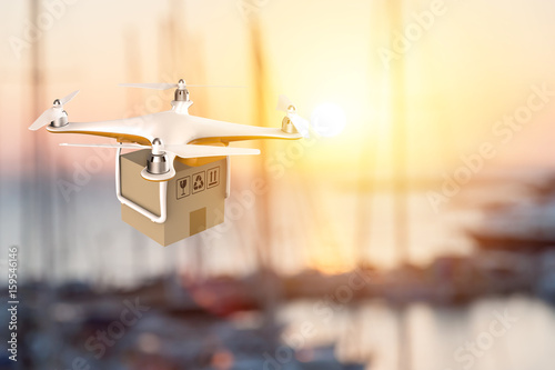 Drone flying with a delivery box package in an harbour