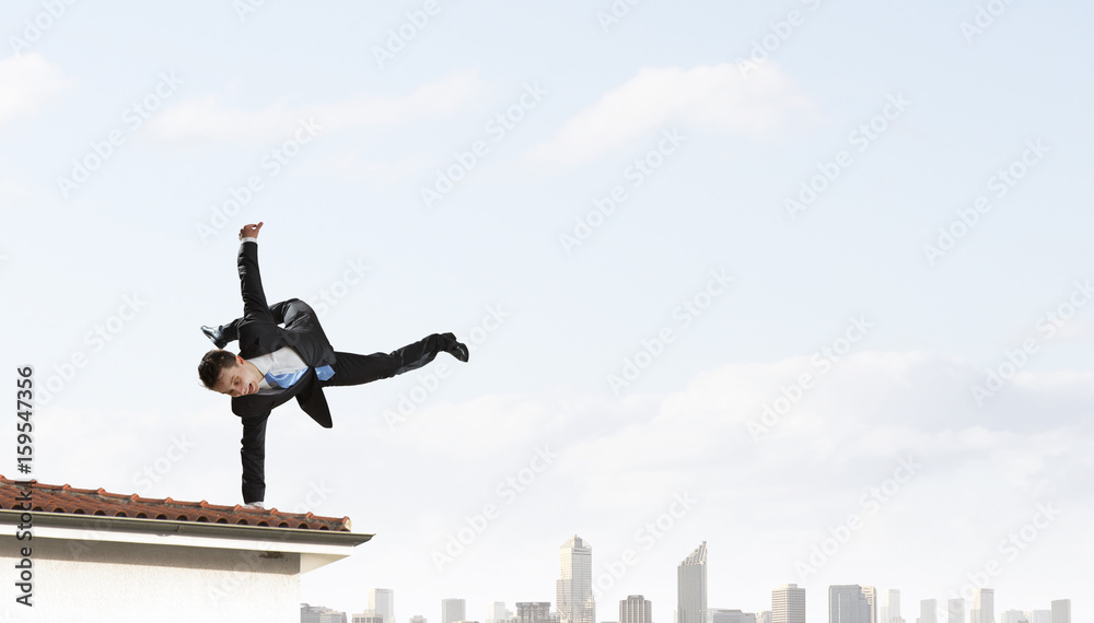 Young businessman breakdancer. Mixed media Young businessman breakdancer. Mixed media