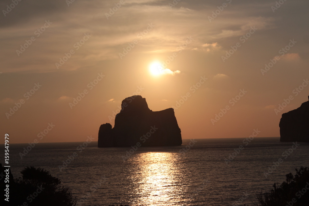 Tramonto mare isolotto Pan di Zucchero Nebida Sardegna