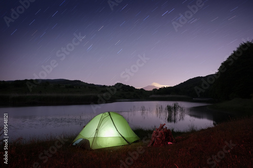 Fototapeta Naklejka Na Ścianę i Meble -  Tent On The Lake In Nebrodi Park, Sicily