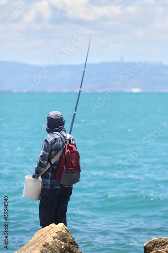 People fishing on the Mediterranean coast 