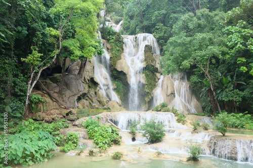 Nature landscape of waterfall .Mountain river waterfall in the middle of the forest  