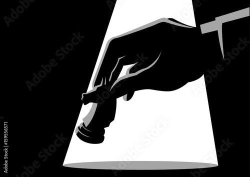 Man hand holding chess knight piece