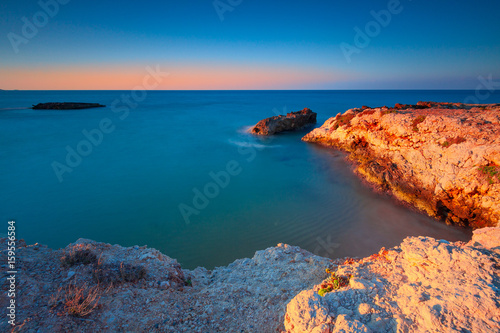 Amazing seascape, landscape with sunrise or sunset. Long exposure.