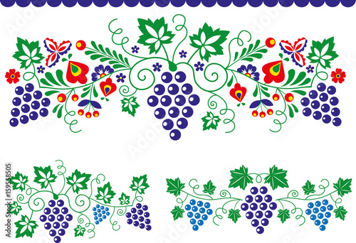 Folk ornaments with grapes photo