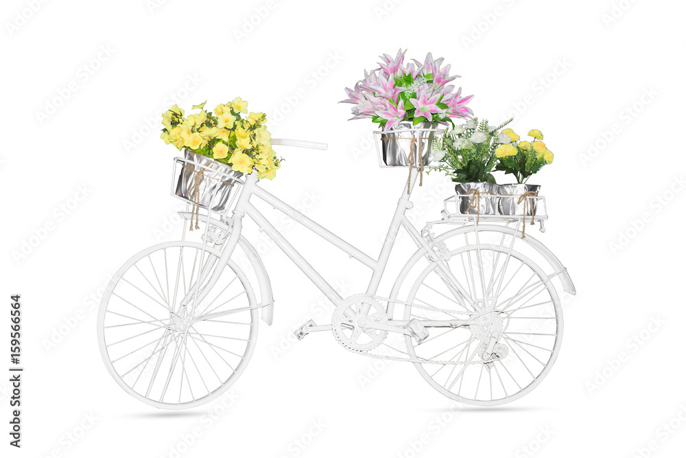 Fototapeta White bike on the seat and basket flowers isolated white background.