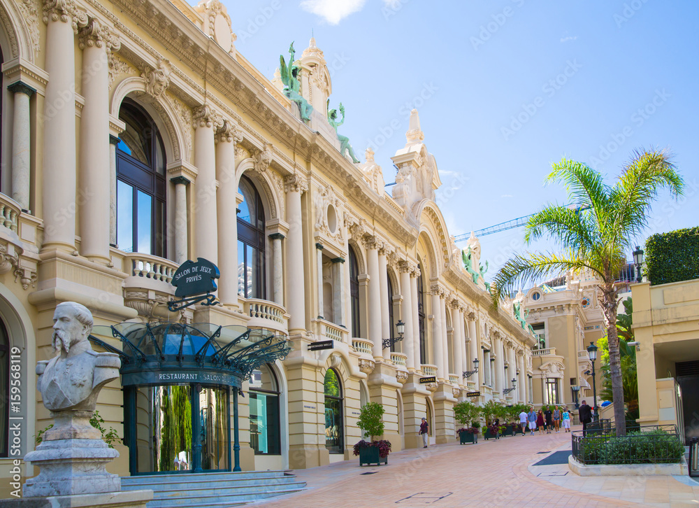 Monaco, The Grand casino Monte Carlo, gambling and entertainment complex in Cote de Azul and walking people 