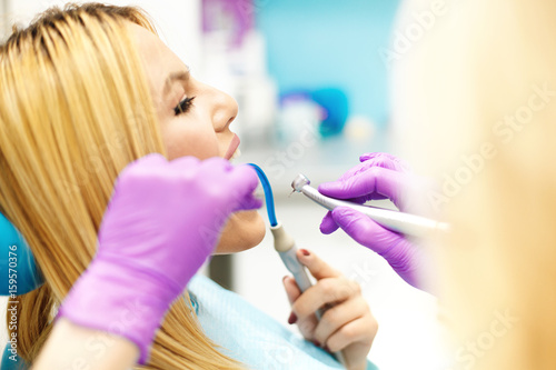 Young Woman At The Dentist