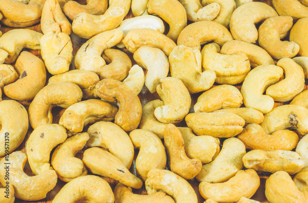 Close up of Roasted cashew nuts  for the background ,pattern ,texture, top view
