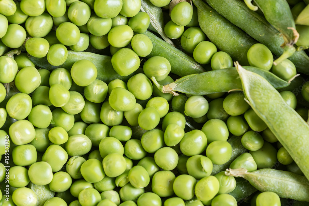 Pile of fresh green peas closeup macro view above Pile of fresh green peas closeup macro view above