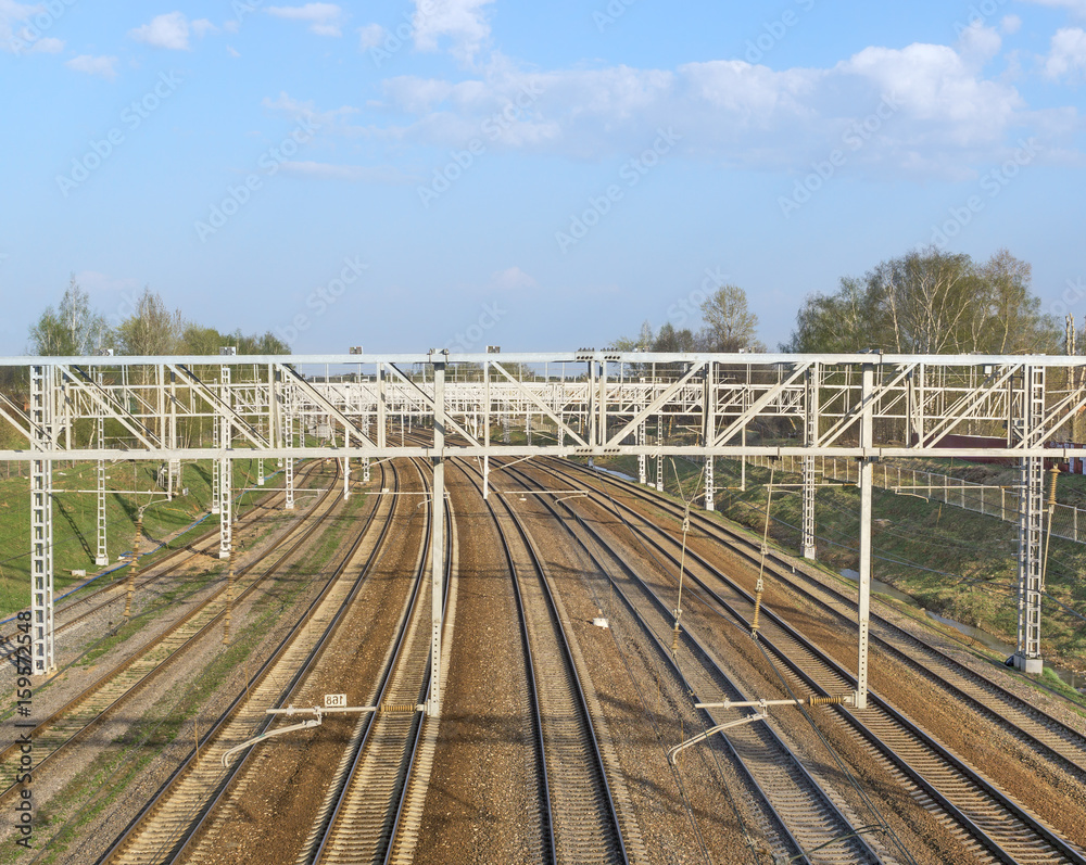Railroad track and prop of power line Railroad track and prop of power line